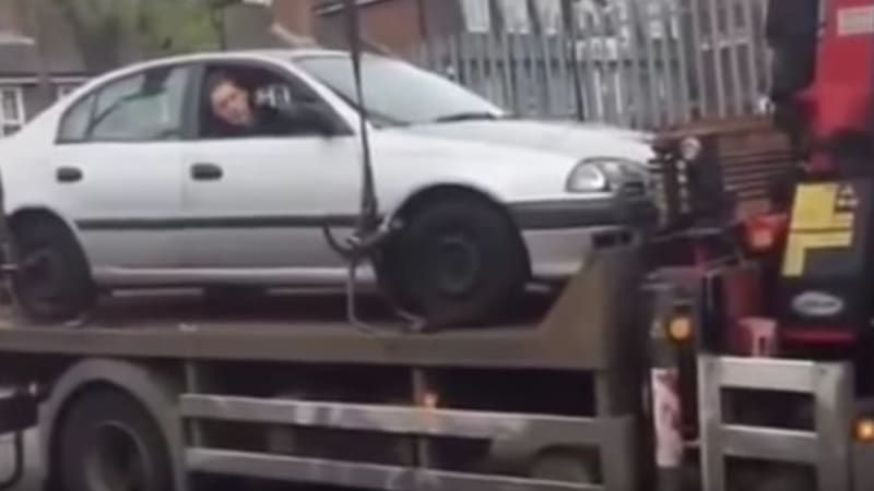 Man tries to escape tow truck and fails spectacularly